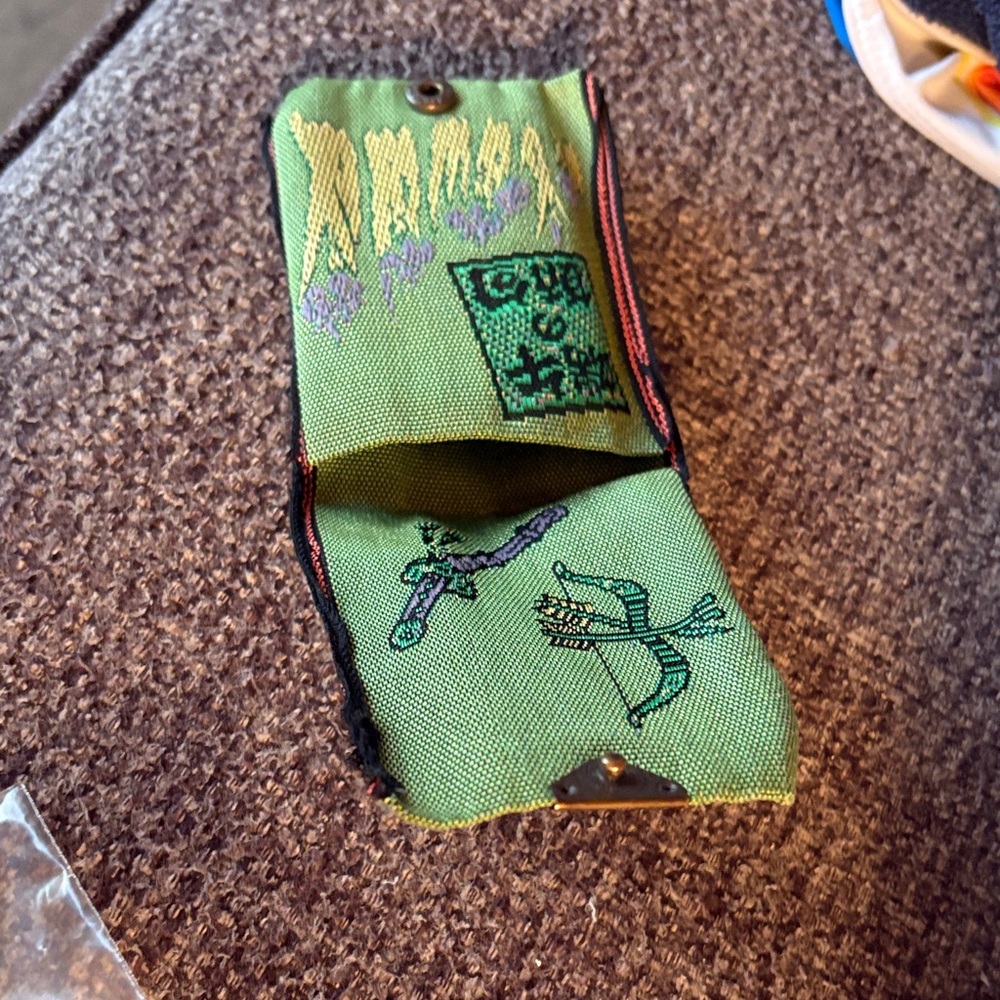 Green Embroidered Fabric Pouch for coins. Made in Japan. Recycled materials.